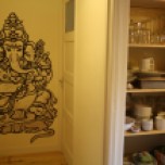 Ganesha mural next to the front door: a tattoo for your home.
